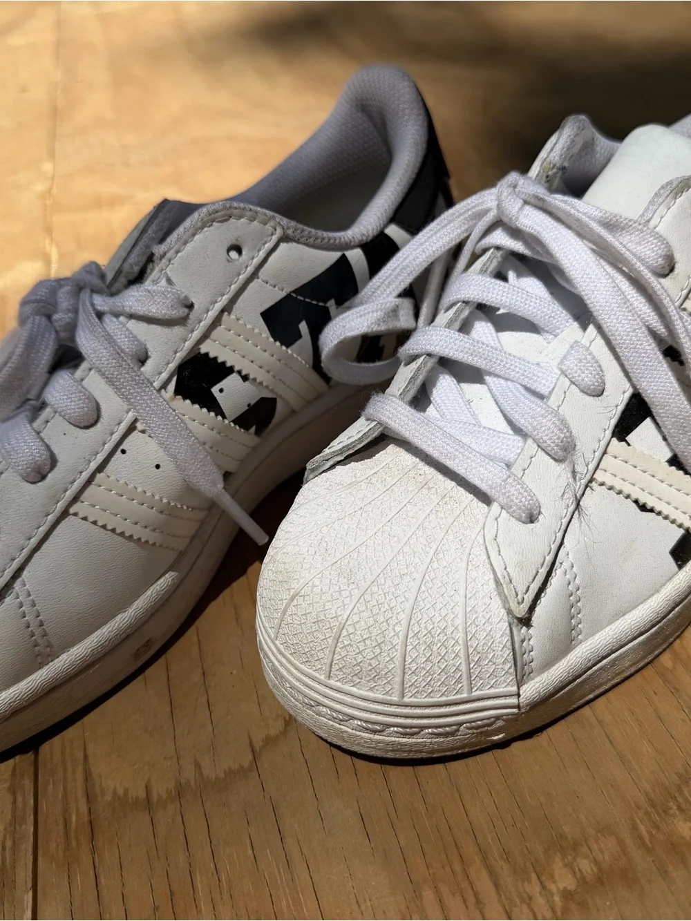 White Adidas Superstar Athletic Sneakers